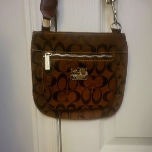 Coach brown cross body purse. Measures 9x9 inches